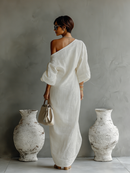 Elena ∙ An elegant, flowing dress with bare shoulders