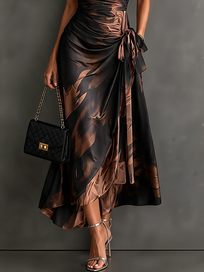 Wrap-style midi dress with an abstract brown and black print